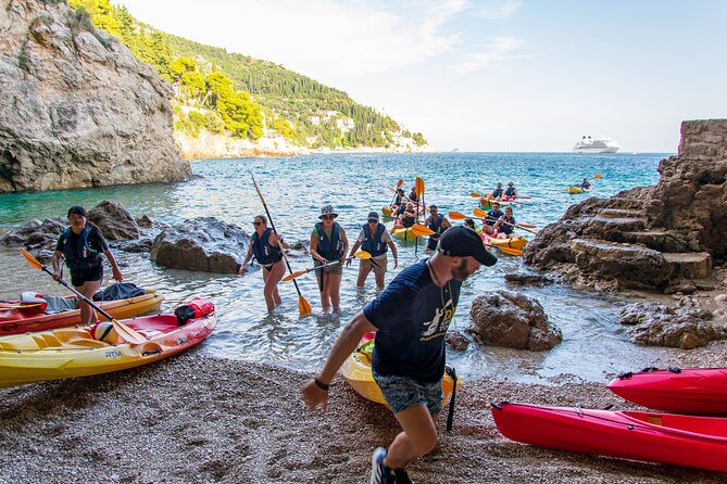 Afternoon Dubrovnik Guided Kayaking Tour - Betina Cave’s rocky beach and clear water