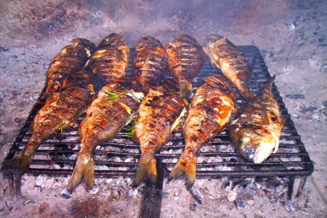 All-inclusive Gastro Blue Cave Tour from Split - Entering the Blue Cave on Biševo