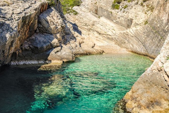 Blue cave group tour with swimming and snorkelling from Hvar - Stiniva Cove and its dramatic entrance