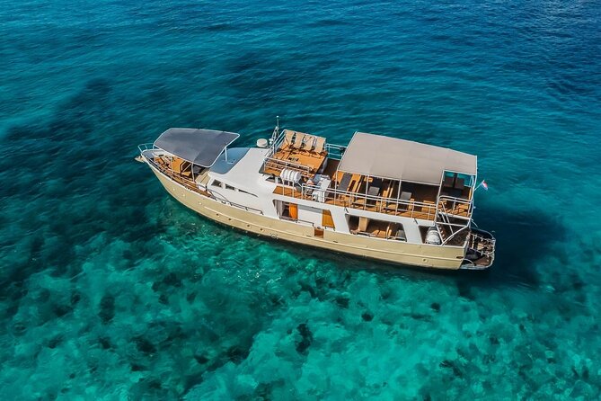 Blue Lagoon and 3 Island Boat Tour with Food and Drinks Included - Nečujam on Šolta brings the most unusual swim