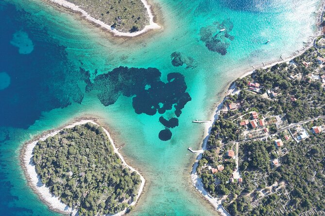 Blue Lagoon Tour from Split with Bottled Water and Wine Included - Trogir gives the morning a historic start