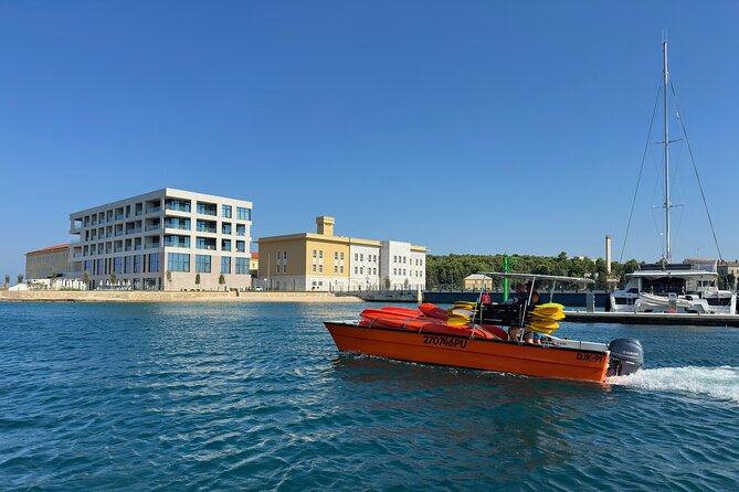 BOAT & KAYAK! Sea Adventure - Snorkeling & Cliff Jumps - The support boat and the first paddle