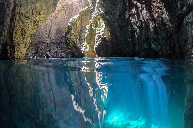 Cave exploring by kayak - Swimming into the cave, not kayaking inside