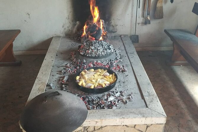 Croatian Traditional Cuisine: Peka Cooking Lesson - Watching the Fire Do the Work