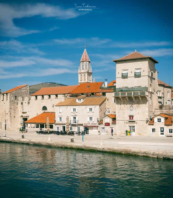 Discover Trogir: Guided Walking Tour of a Medieval Gem - Passing through the ancient town gate