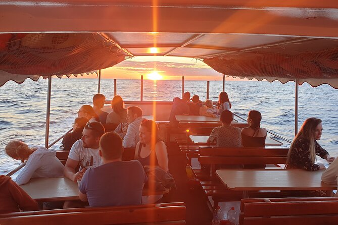 Dolphin Watching Sunset Boat Trip in Pula with Dinner - Key points before you book