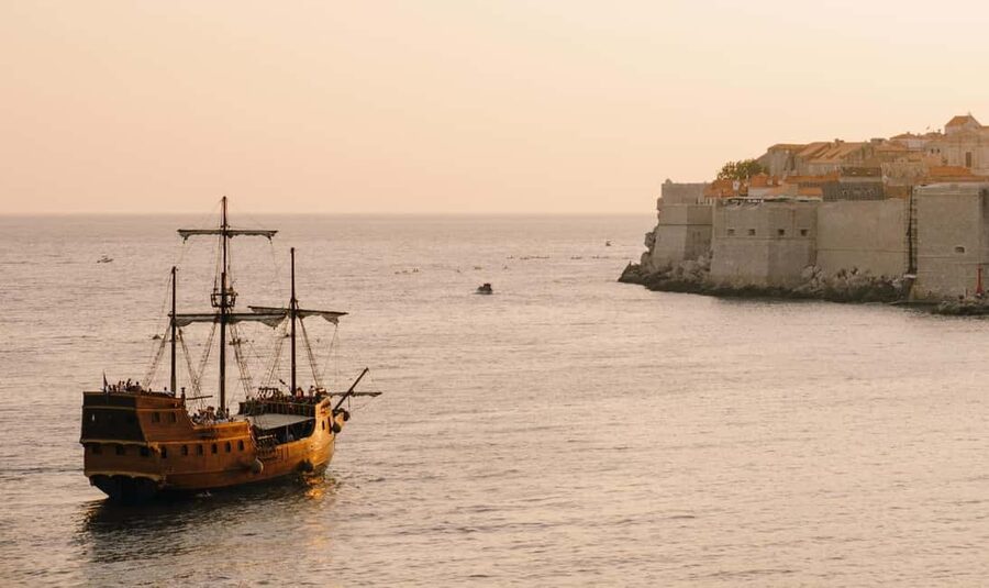 Dubrovnik: Galleon Sunset Cruise with a Live Guide & Drink - Boarding the Galleon Tirena at Dubrovnik’s Old Town port