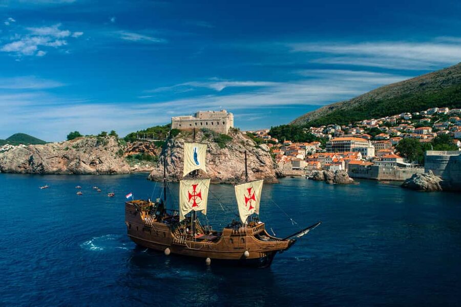 Dubrovnik: Galleon Sunset Cruise with a Live Guide & Drink - The welcome drink and first views of Dubrovnik
