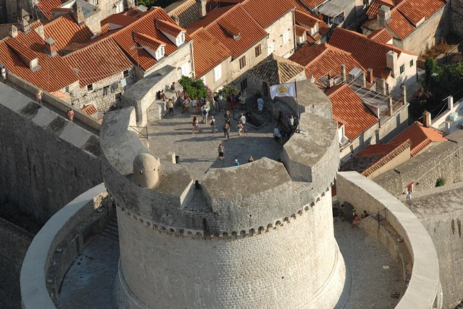Dubrovnik Old City Walls Private Tour - Buža Gate, rooftops, and the climb to Minčeta