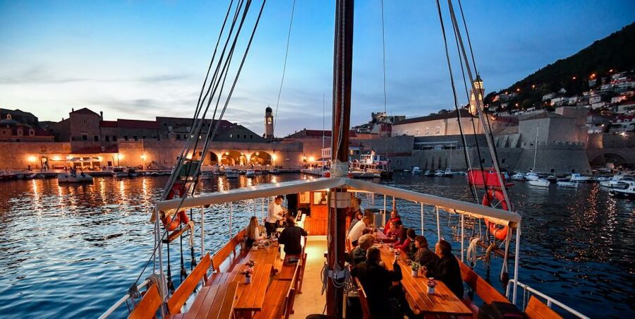 Dubrovnik: Panoramic Sunset Cocktail Cruise Around Old Town - The first views: Dubrovnik’s walls from the water