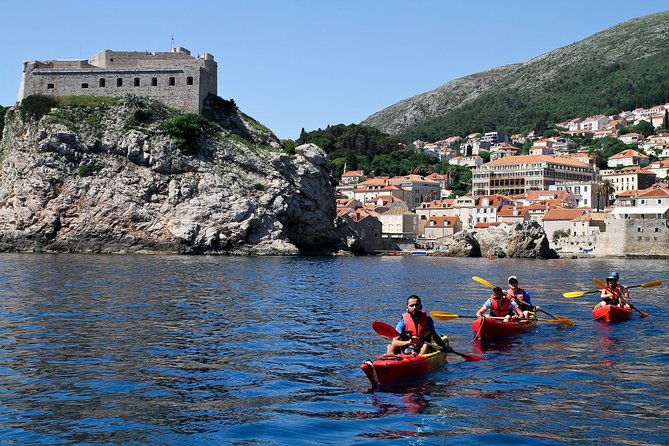 Dubrovnik: Sunset Kayaking & Snorkeling with water &wine - Paddling beside Dubrovnik’s walls