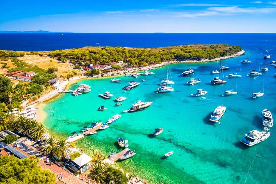 From Hvar: Blue Cave, Green Cave & 5 Islands Speedboat Tour - What the crew adds to the experience