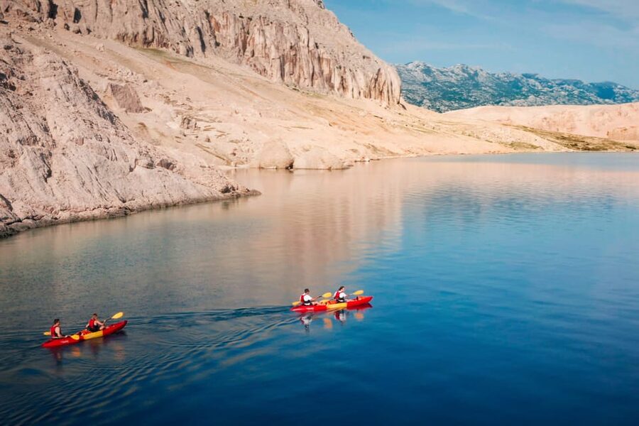 From Metajna/Novalja: Pag Bay Guided Sea Kayaking Tour - Entering Gače Cave by kayak
