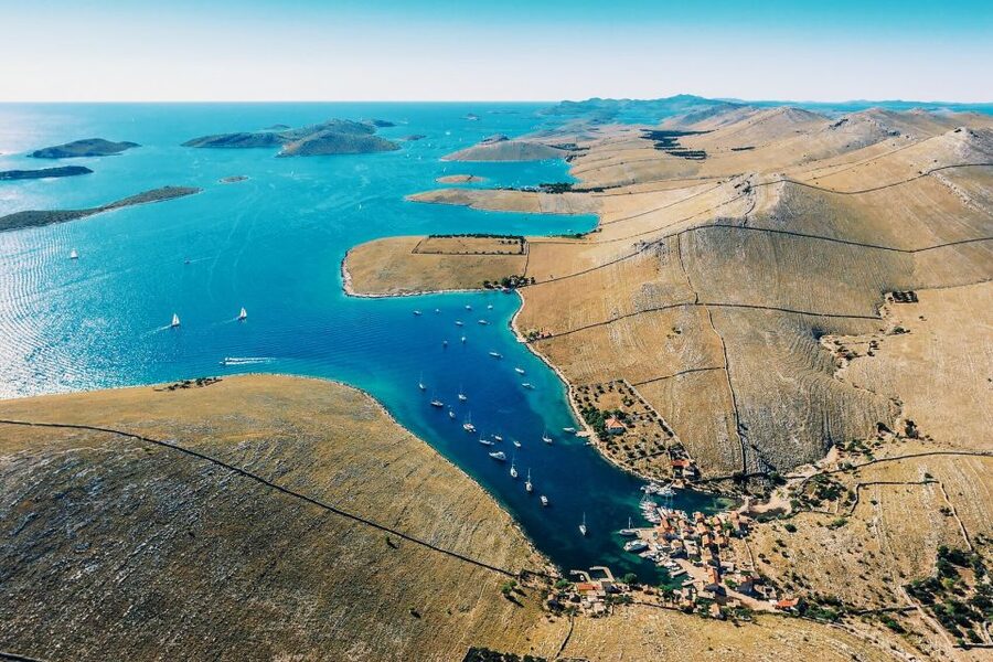 From Sinj: 1.5-Hour Private Flight over Kornati & Šibenik - Rogoznica and Primošten bring the coast into focus