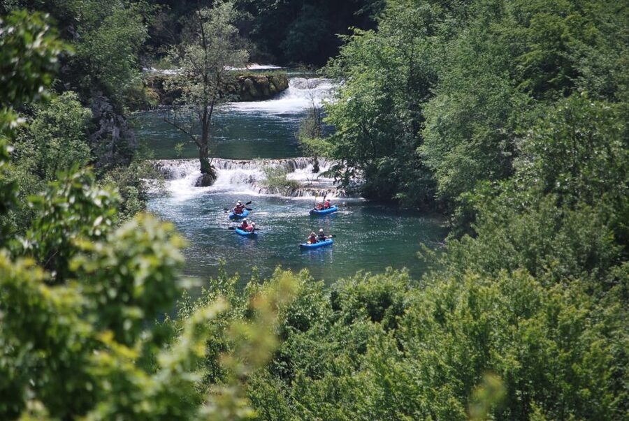 From Slunj: Mrežnica Canyon Kayaking Tour - Arriving in Primišlje for the 15-minute safety briefing