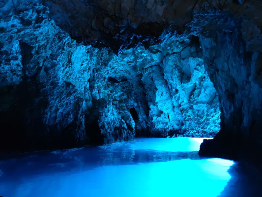 From Split: Luxury Cabin Boat Tour to The Blue Cave and Hvar - Entering the Blue Cave on Bisevo
