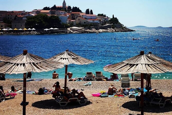 From Split or Trogir: Krka Waterfalls & Primošten Sightseeing - Primošten: two hours of sea, stone, and free time