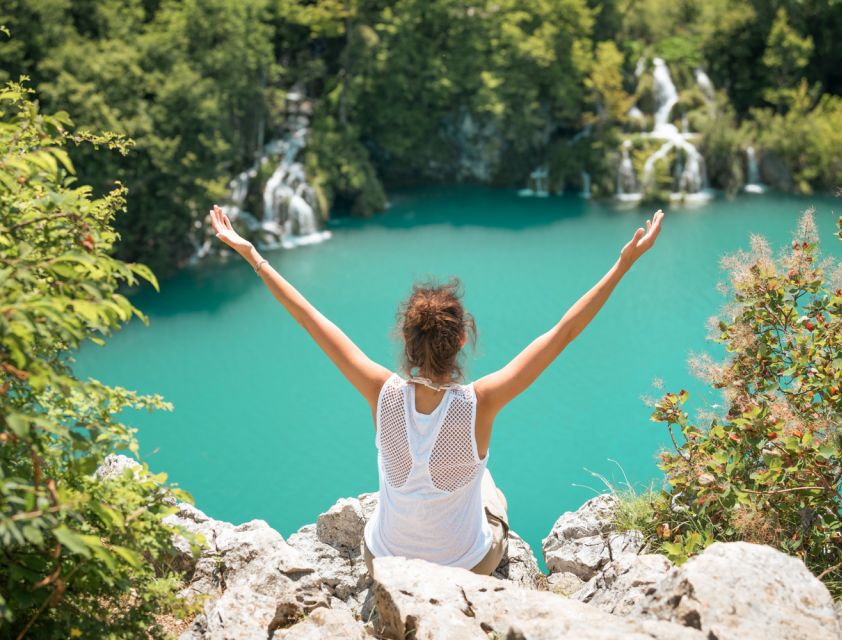 From Split or Trogir: Plitvice Lakes Guided Full-Day Tour - Walking the wooden paths through 16 lakes
