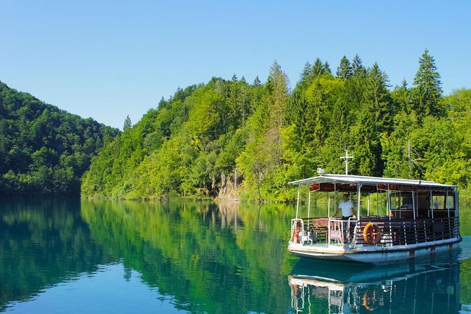 From Split: Plitvice Lakes National Park Guided Tour - What the boat and train rides add