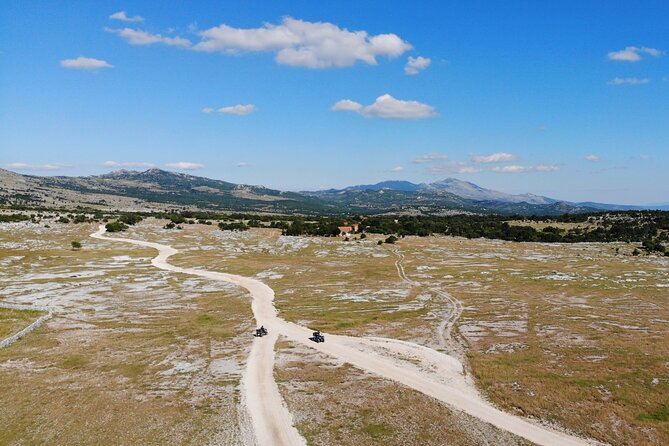 From Split: Small group ATV ride in Dinara NP - The Cetina River brings a cooler, greener stop