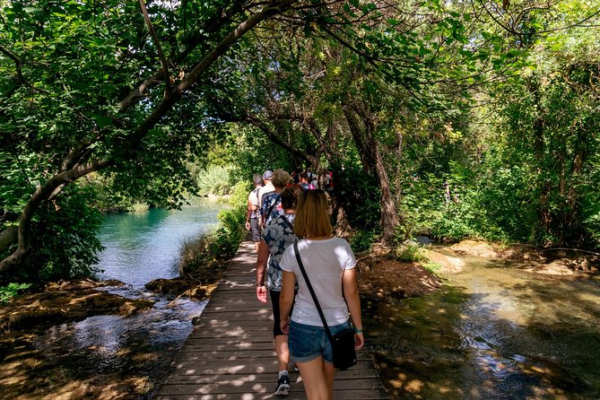 From Zadar: Krka National Park and Waterfalls Day Trip - Walking through Skradinski Buk