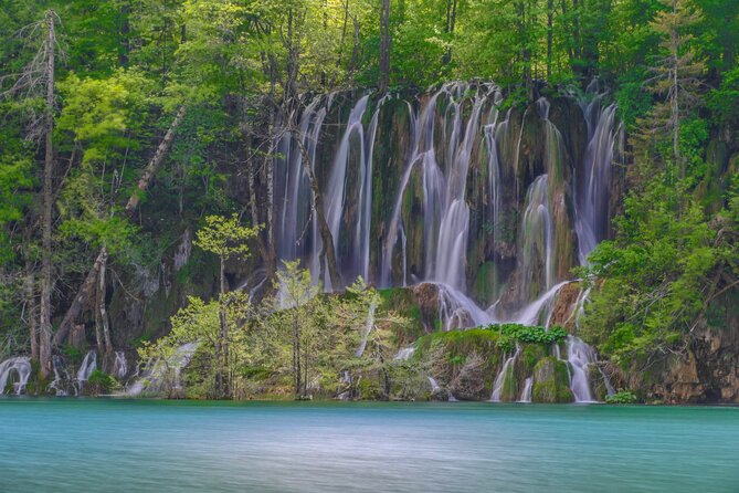 From Zadar: Plitvice Lakes Guided Day Tour with Tickets - Why the boat and electric train matter