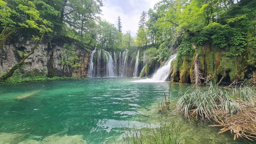 From Zadar: Plitvice Lakes Guided Tour with Boat & Train - Four to five hours among the waterfalls