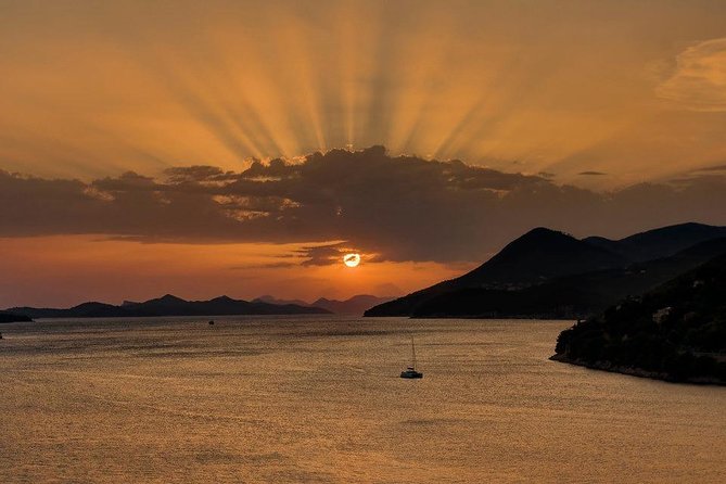 Golden hour SUNSET CRUISE from Dubrovnik Old Town - Champagne, dried fruit, and the onboard mood
