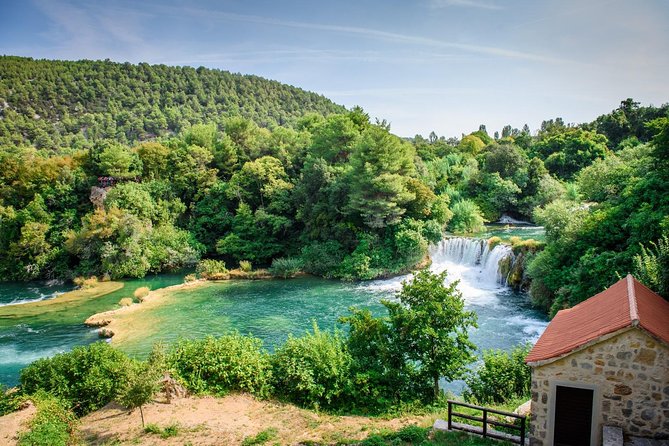 Krka Waterfalls and wine tasting Tour from Split or Trogir - Walking through Skradinski buk