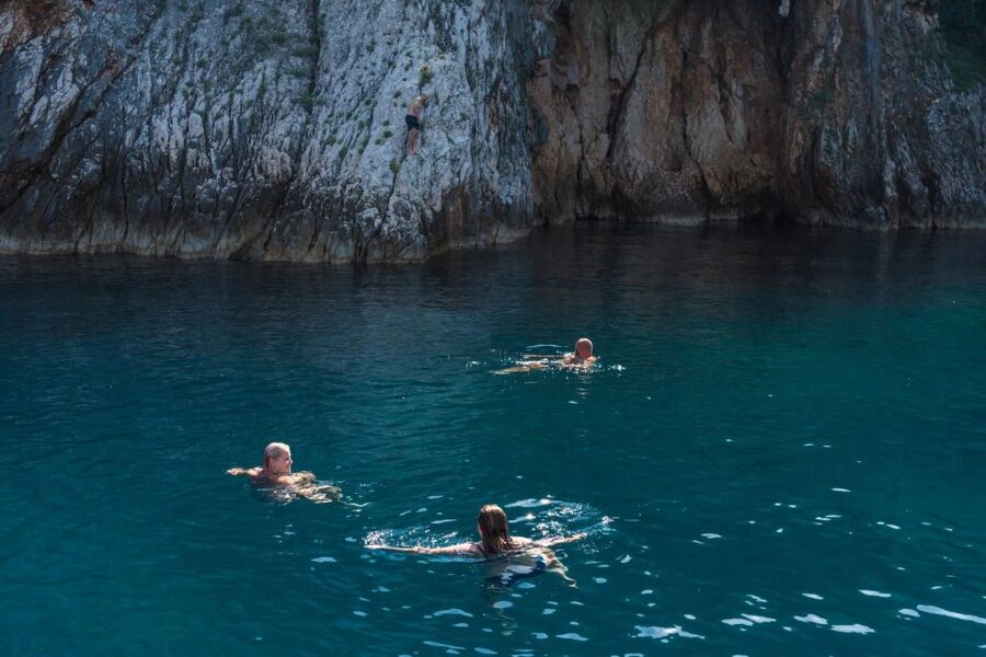 Lovran/Opatija: Swimming on Cres Island with Lunch - Brseč’s 60-meter cliffs from the water