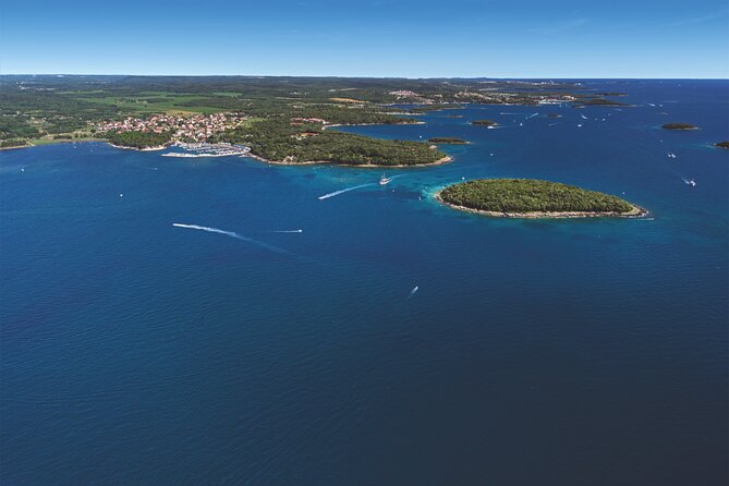 Morning Panorama: Relaxing Among 20 Islands around Poreč Riviera - The return view of Poreč and its peninsula