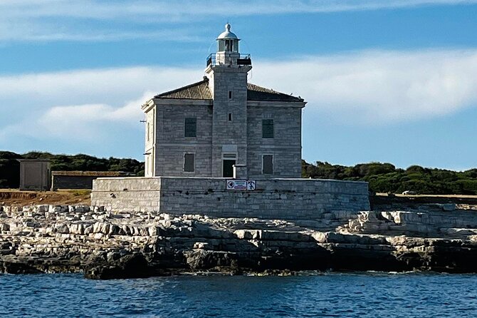 NP Brijuni Island Swimming & Dolphin Watching Sunset Cruise - The sunset and Pula’s harbor lights