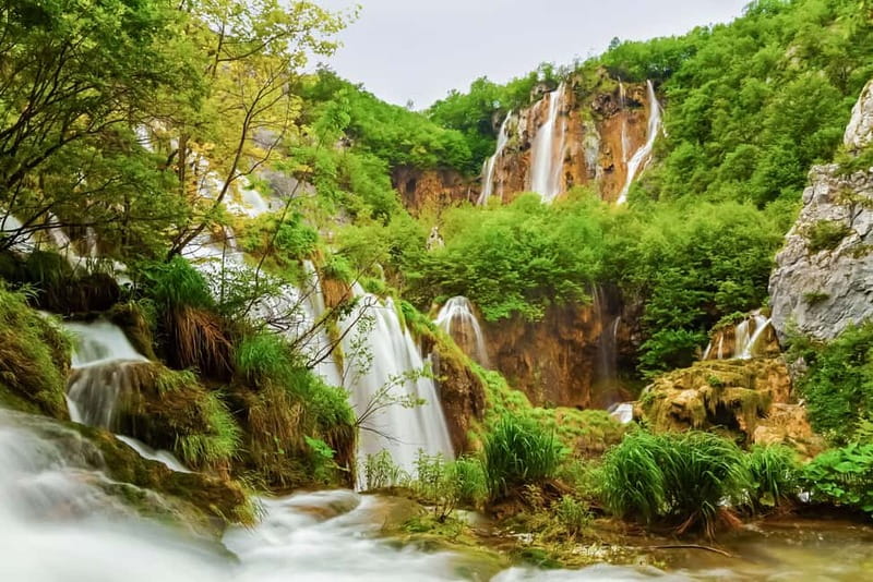 Plitvice Lakes: Guided Walking Tour with Train and Boat Ride - The lower lakes: the most dramatic introduction