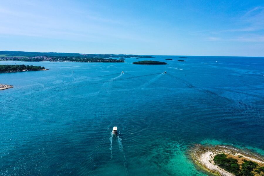 Poreč: Panoramic Morning Cruise Among 20 Islands with Drinks - Calm Water, Wind, and Seasickness