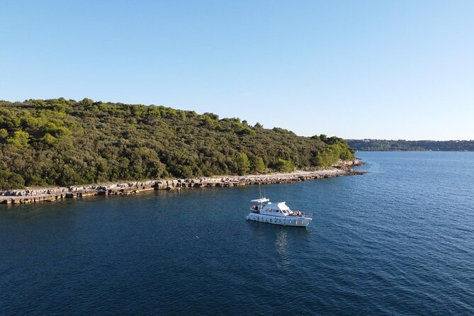 Private Boat Tour with activities in Pula Croatia - Leaving Pula harbor and its naval past