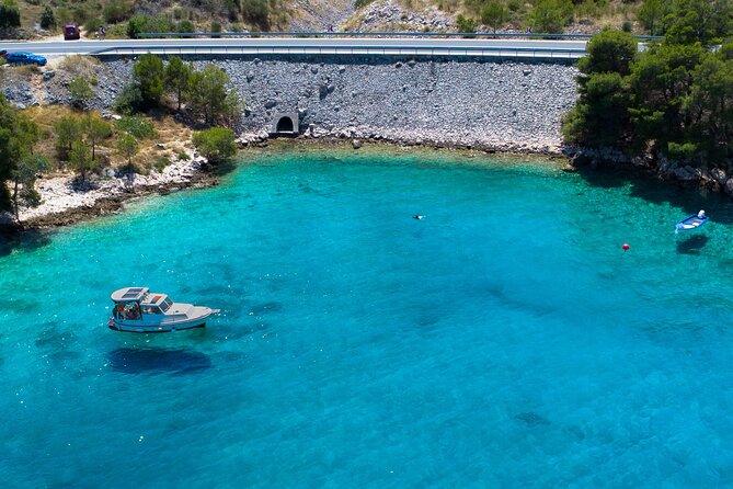 Private Boat Trip Swim and Chill in Crystal Blue Šibenik half day - Swimming, snorkeling, and family appeal