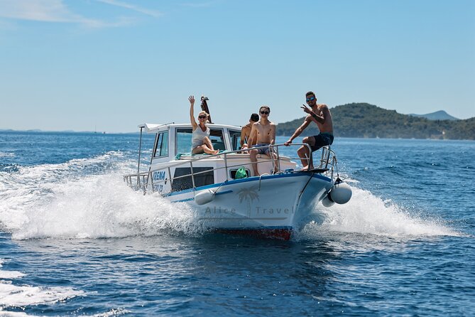 Private Half-Day Boat Tour with Snorkeling and Drinks - Leaving Zadar by traditional wooden boat