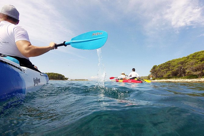 Private Half-Day Kayak Experience in Hvar and Pakleni Islands - Beach stops, swimming, and snorkeling
