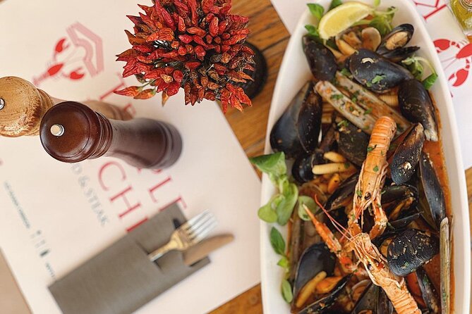 Private Split Tour & Local Bites & Seafood Extravaganza & Pickup - Seafood stew on Let Me Pass Street
