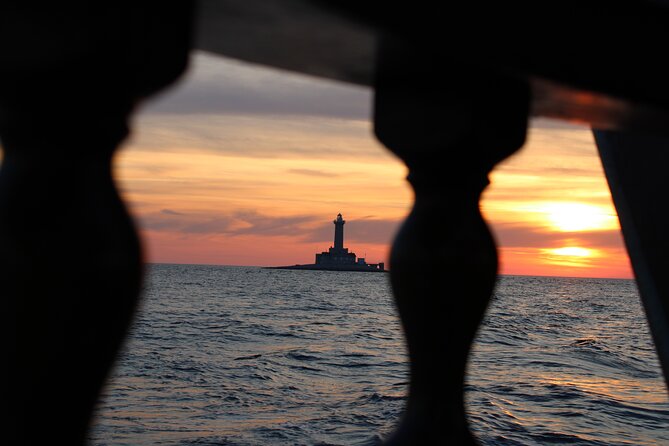 Private Sunset Dolphin Excursion with Dinner and Animation - The Austro-Hungarian lighthouse story
