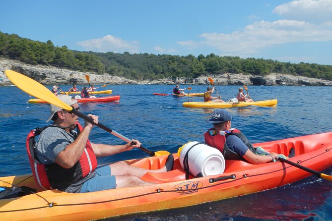Pula Kayak, Cliffs & Snorkeling Adventure - Paddling toward Pula’s cliffs and military zone