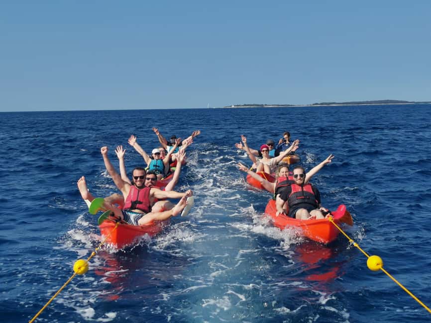 Pula: Sea Adventure – Boat, Kayak, Snorkeling & Cliff Jumps - Swimming and snorkeling at a secluded beach