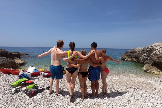 Pula Sunset Adventure – Boat, Kayak, Snorkeling & Sunset - Cliff jumping with the guides nearby