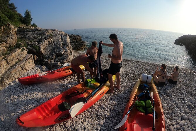 Pula Sunset Adventure – Boat, Kayak, Snorkeling & Sunset - Drinks, fruit, and underwater photos
