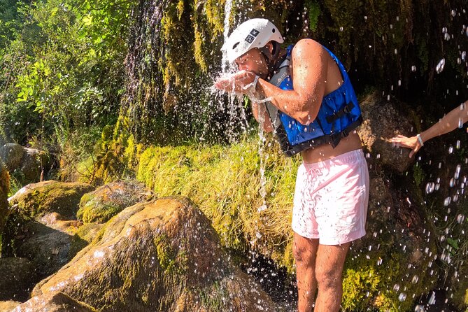 River Rafting from Split- Cliff Jumping- Cave Visit - Entering the cave behind the waterfall
