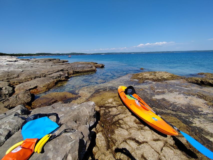 Rovinj: Golden Cape Desert Islands Kayak & Snorkeling Tour - Rock jumping is fun, but never required