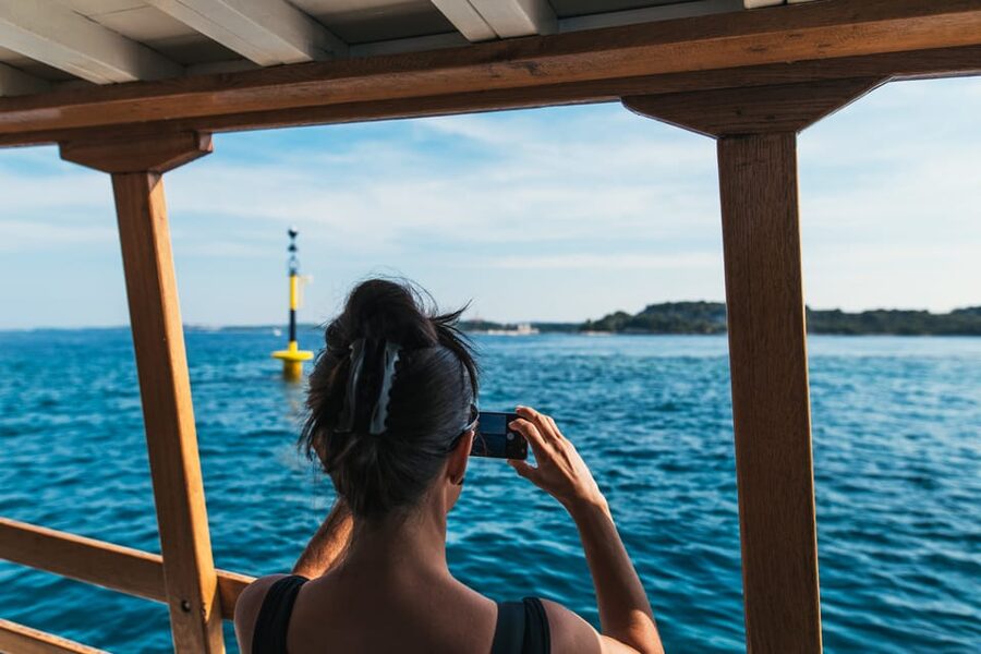 Rovinj: Sunset Cruise with Swim Stop, Drinks, and Fruits - Dolphin watching depends on patience and luck