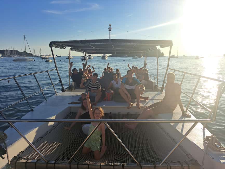 Rovinj: Sunset & dolphin group tours with Catamaran - Local stories instead of a standard script