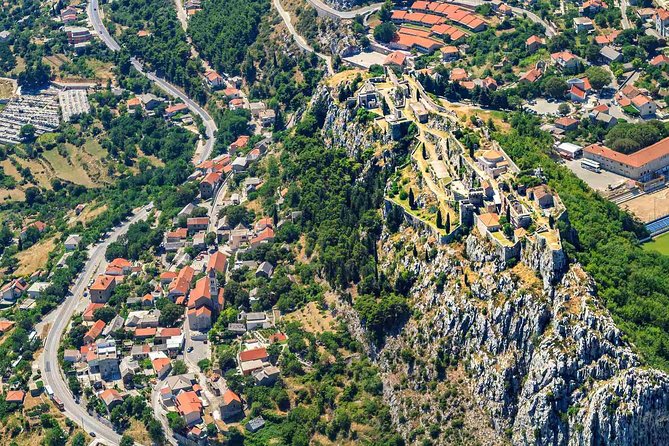Sinj: Panoramic Flight over Peruca Lake and Dinara mountain - Starting above the proud city of Sinj