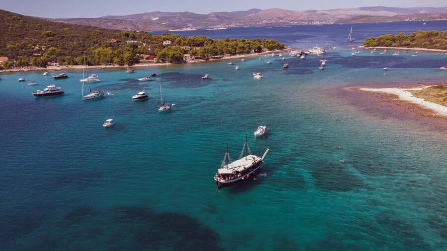 Split: Blue Lagoon & 3 Islands Tour with Lunch & Hidden Bay - Blue Lagoon: Turquoise Water and Busy Anchoring